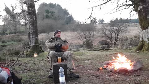 Vlog by a campfire. Riverside campfire