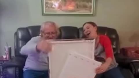 Dad & Allyson open their gift