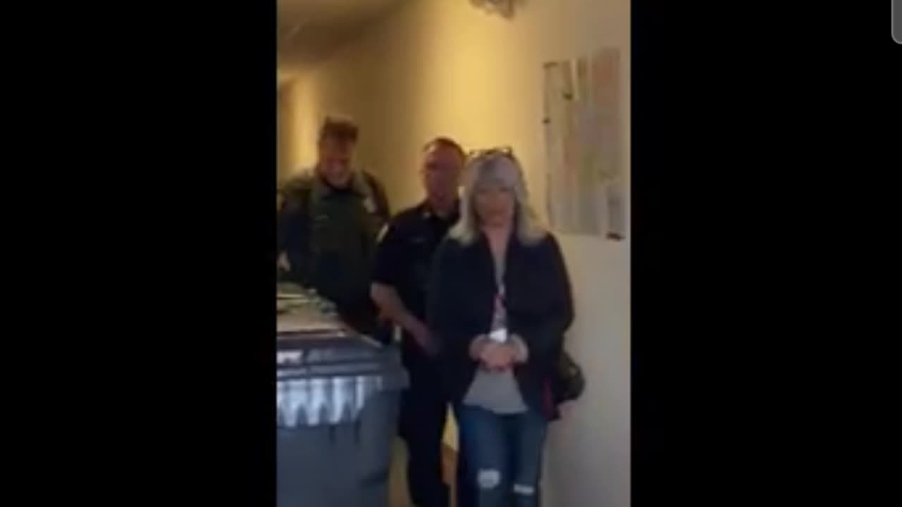 Election Observer being escorted out of the Island County Elections Office