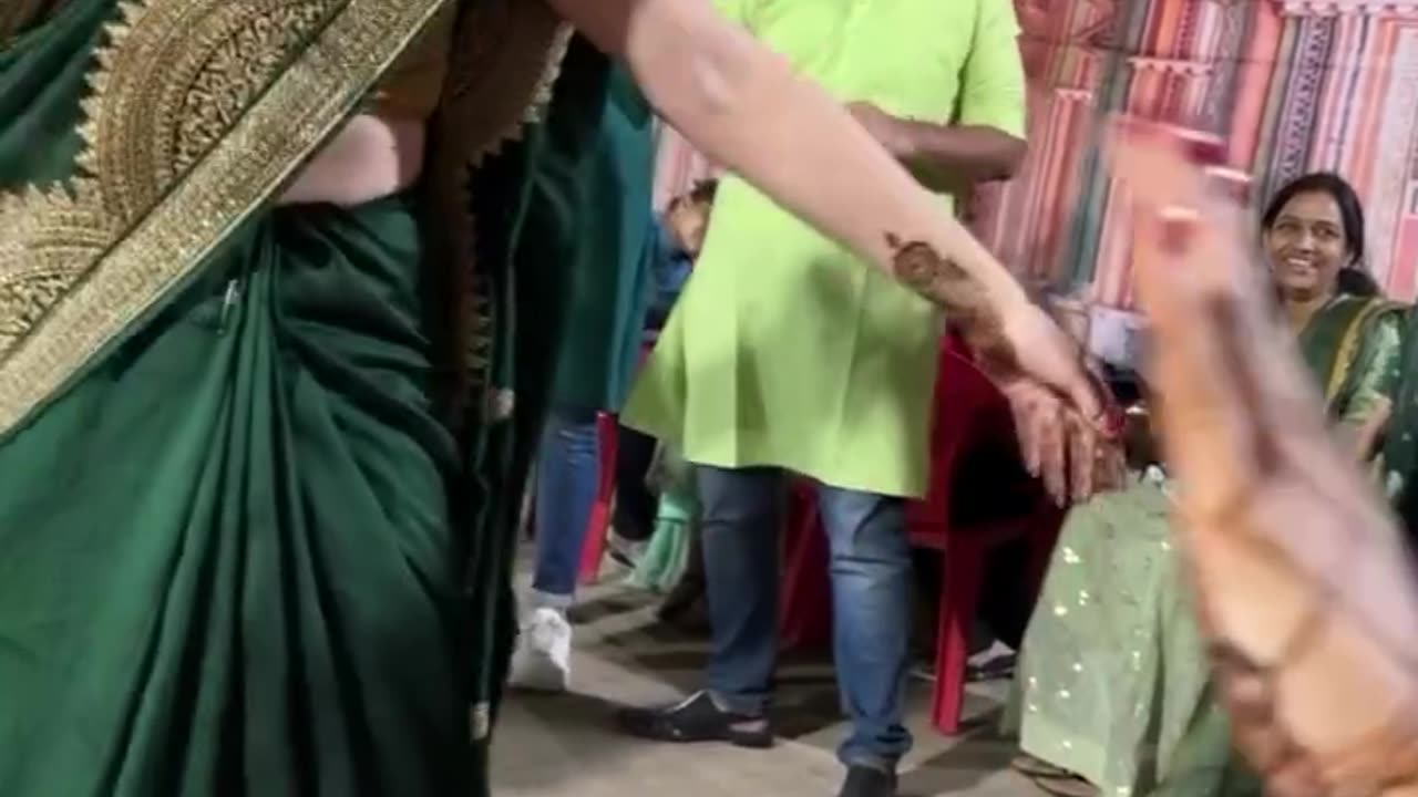 Harmony in Diversity: An English Girl's Joyful Saree Dance at an Indian Wedding