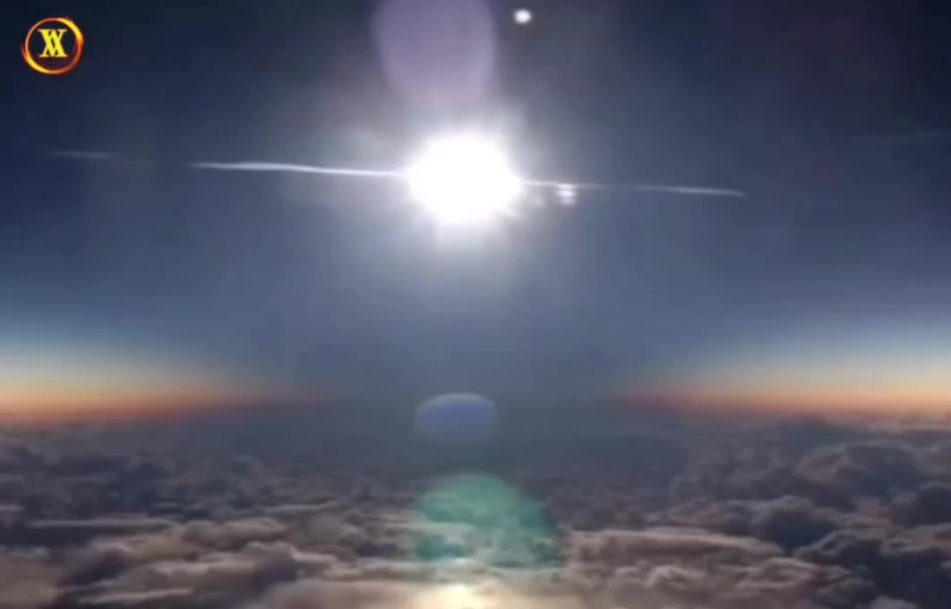 SOLAR ECLIPSE FROM AN AIRPLANE.