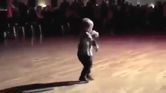 Little Boy Dancing to Jailhouse Rock