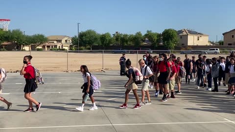 DeAnthony's class filing in after flag ceremony