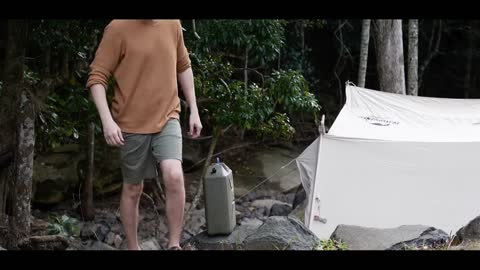 Self driving outdoor camping, enjoying the beauty of the summer forest. Loneliness is the norm of li