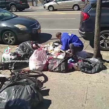 NYC Migrants are now literally eating Garbage