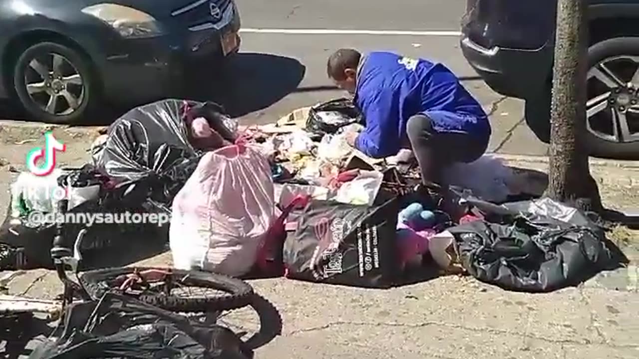 NYC Migrants are now literally eating Garbage