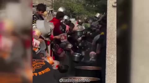 Palestinians gather to collect food for their sustenance