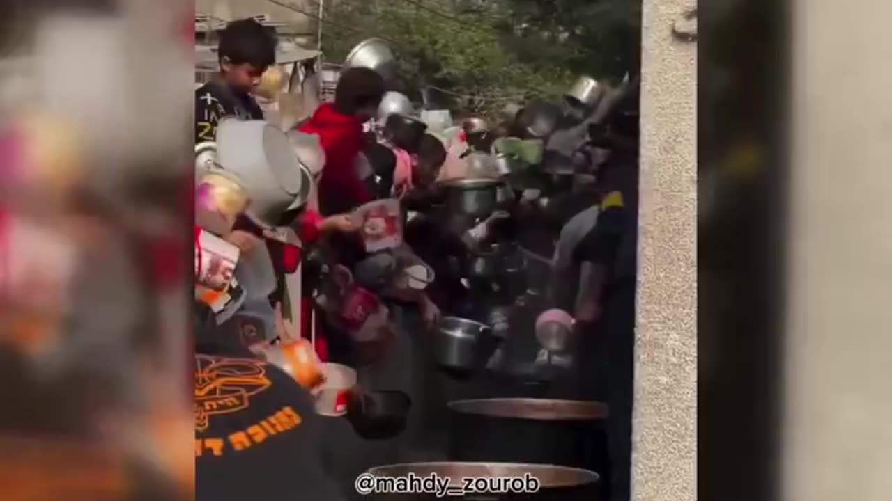 Palestinians gather to collect food for their sustenance