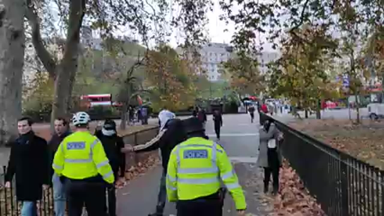 Sgt Berry Escorts Masked Men Out Of The Park Speakers Corner
