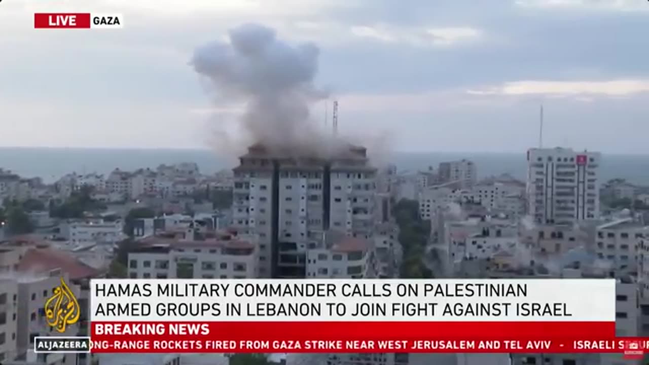 Israel-Palestine Conflict_ Tower hit behind Al Jazeera team