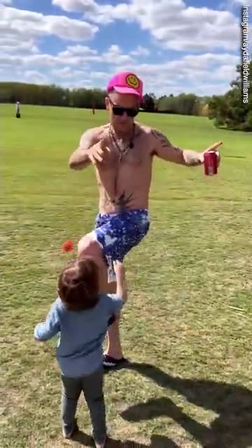 Ayda shares video of topless Robbie Williams enjoying a sunny day