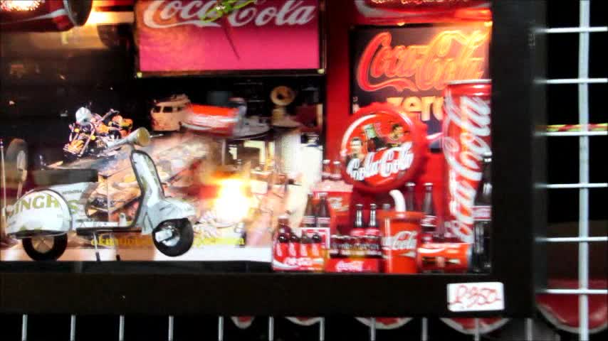 Clocks made from Coca-Cola and Pepsi cans