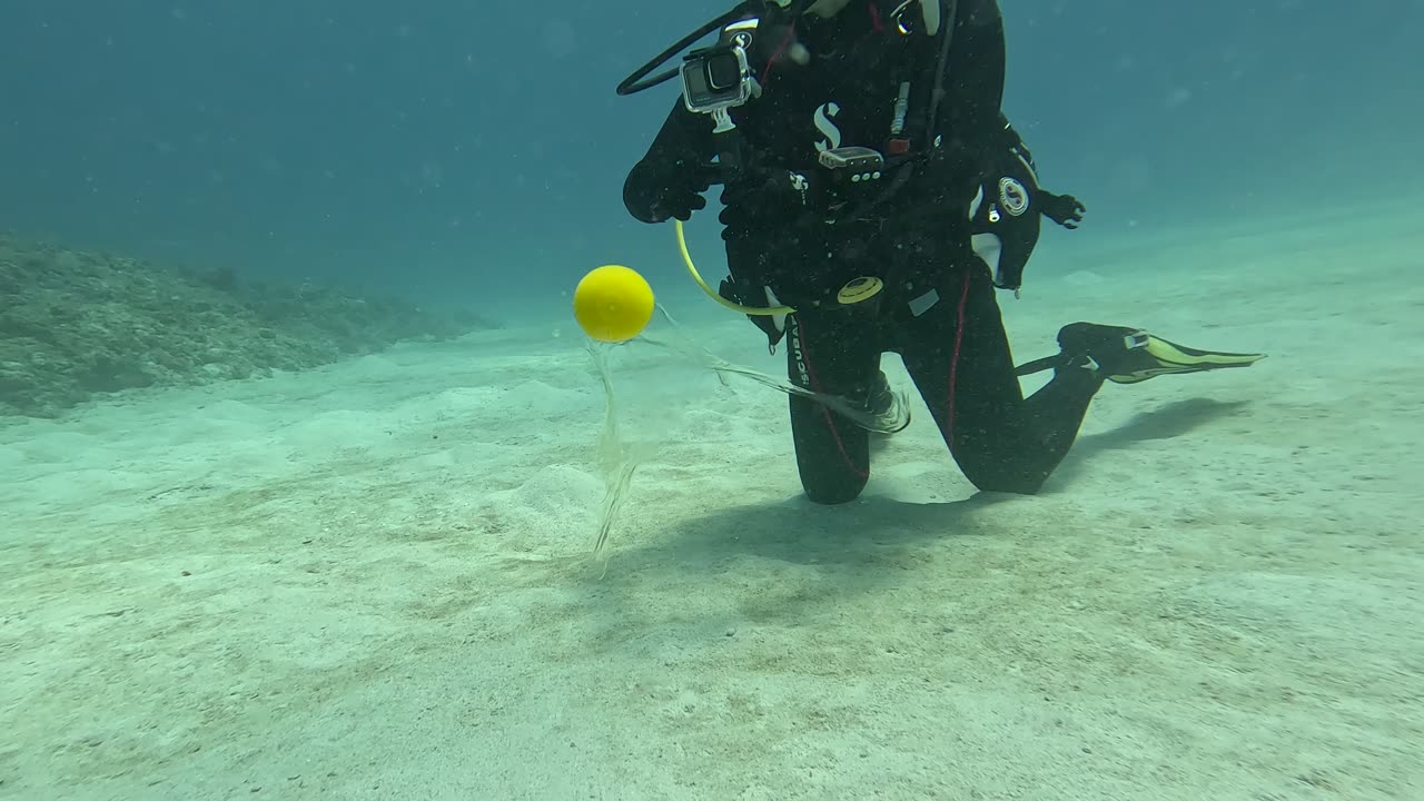 Cracking an Egg Open 12 Meters Underwater