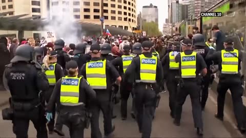 Anti-war protesters clash with police in Australia outside arms convention