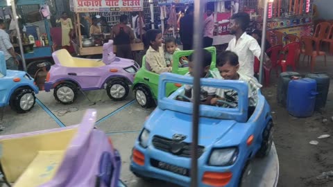 My Son Ahnaf enjoining ride in Festival