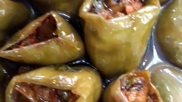 Green pepper stuffed with nuts in oil