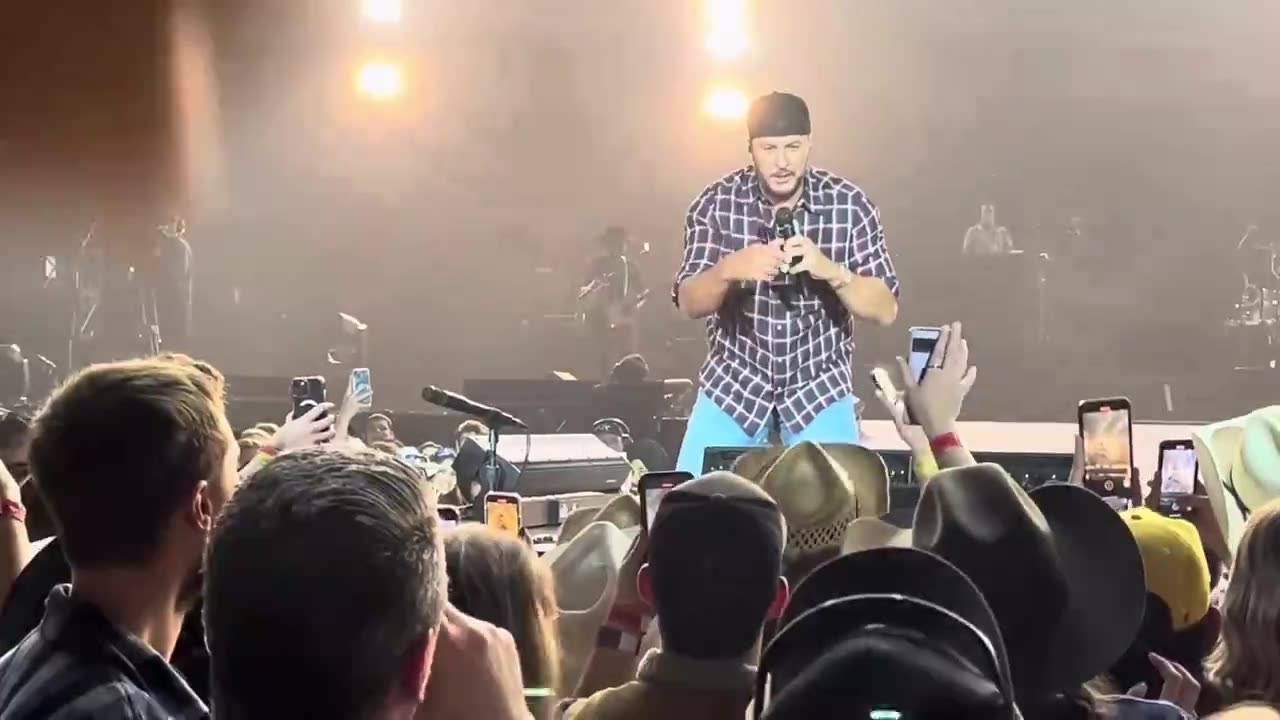 NEW: Country star Luke Bryan slips and falls during performance. Well played.