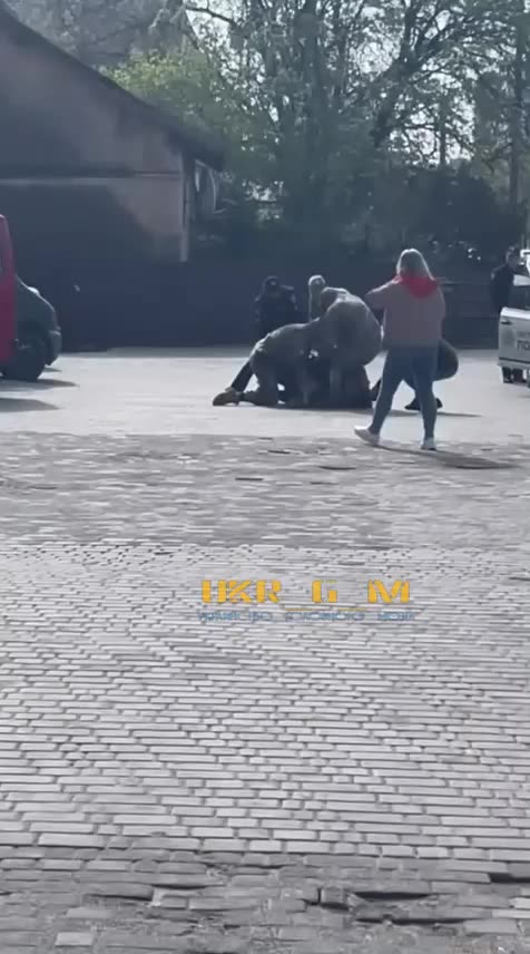 Ukrainian Military enlistment officers" are hard knitting another poor fellow