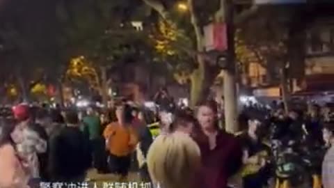 CHINA - This is BBC journalist Edward Lawrence arrested by CCP police for reporting the protests.