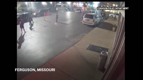 Ferguson police release footage showing protester knocking officer to sidewalk.mp4