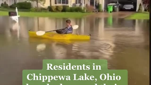 Residents in Chippewa Lake, Ohio kayaked around theirneighborhood after