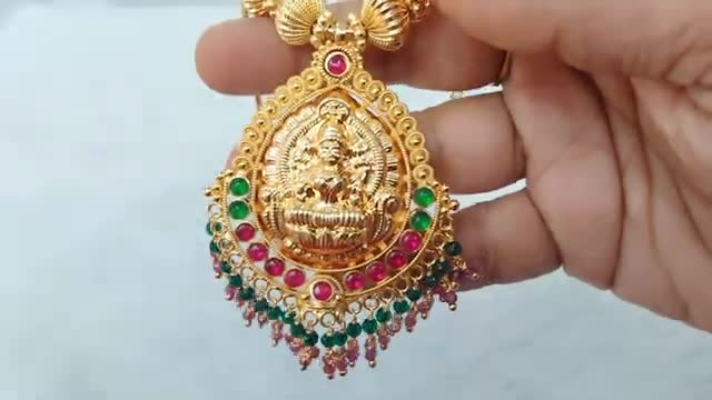 premium gold polish Lakshmi necklace with beautiful makings 7981886441 booking number
