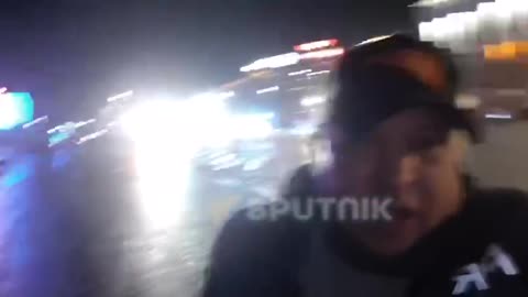 The correspondent broadcasts from the square: