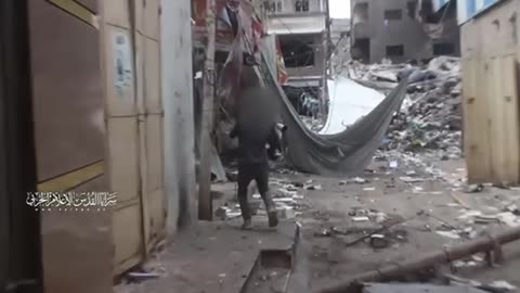 Palestinian forces clash with IDF soldiers in the Jabalia refugee camp in the Gaza Strip