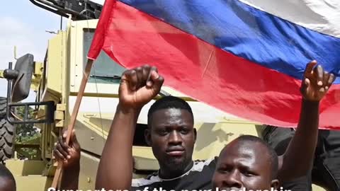 Why Are These People Waving Russian Flags After Their Government Was Overthrown?