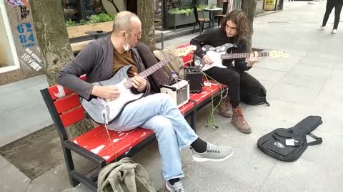 Duo Street Musicians Presented a Great Music Concert Performance with Guitar