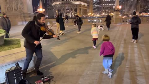 very nice to hearDavide Laura Violin Street Concert With Dancing Kid