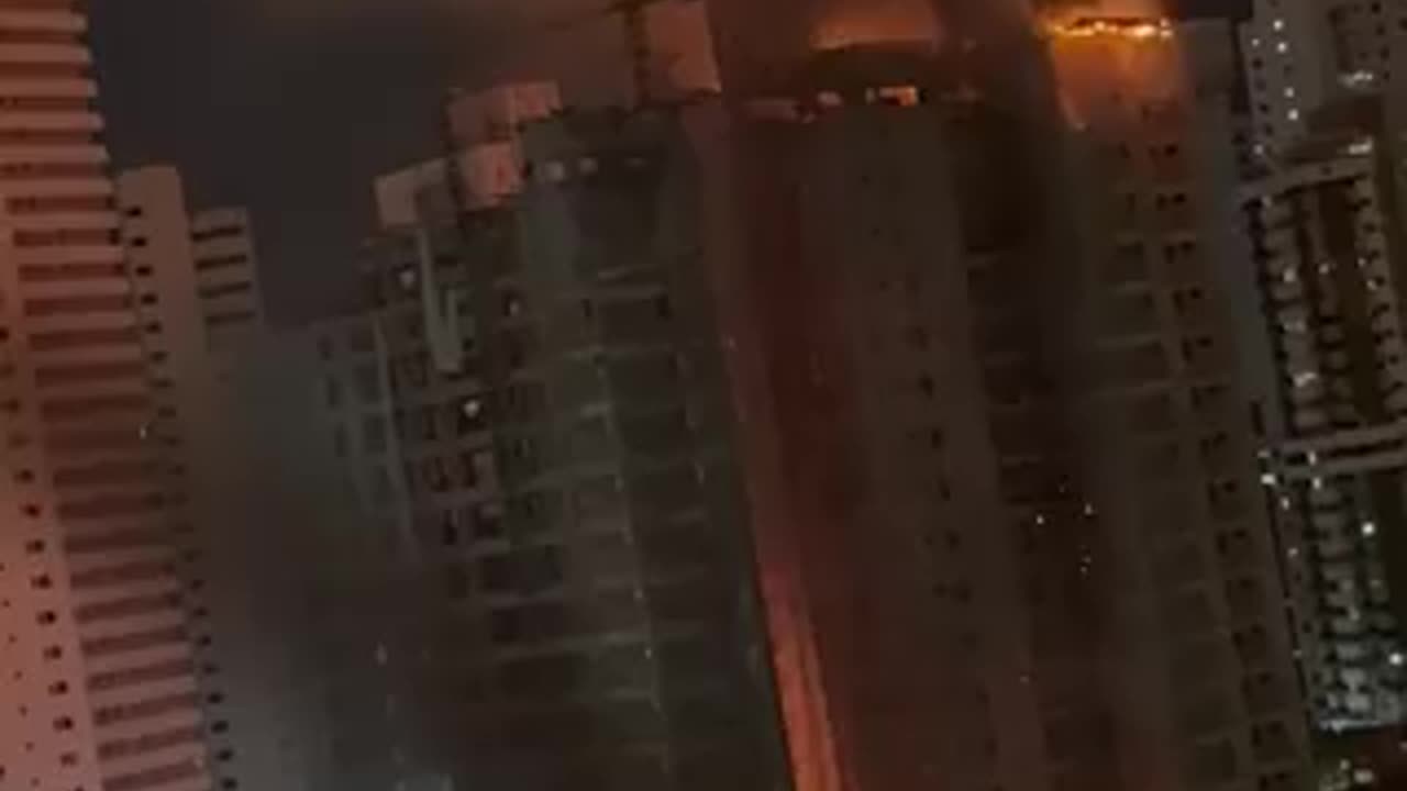 A colossal blaze sweeps through a tall building still under construction in Recife, Brazil.
