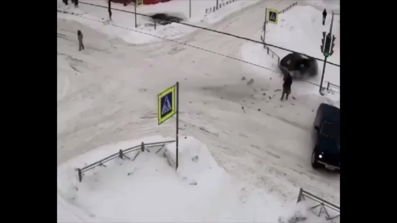 close calls- 2 cars collide narrowly missing pedestrian.