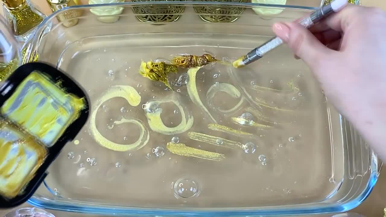 GOLD SLIME | Mixing makeup and glitter into Clear Slime | Satisfying Slime Videos