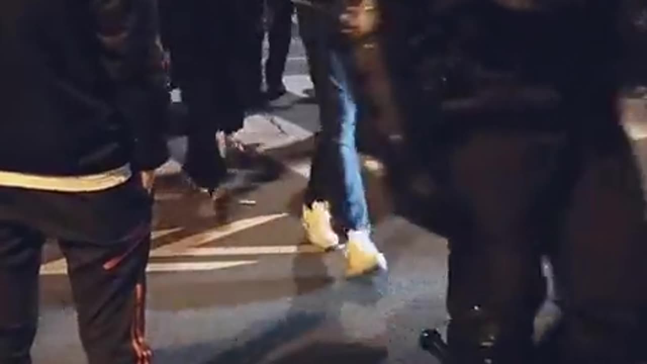 Police officers have removed their helmets and are marching with the people in Paris