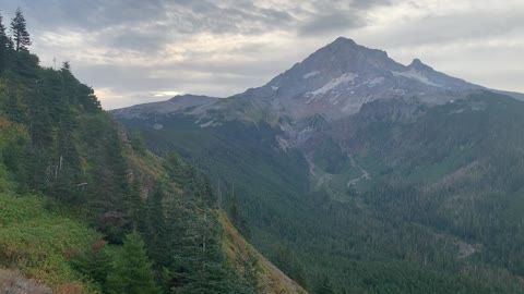 Oregon - Dark Grey Ominous Clouds Frame Majestic Mount Hood