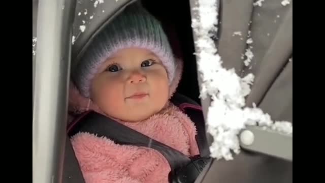 little girl playing in the snow