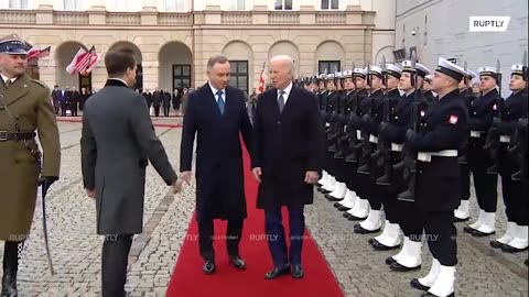 Biden Gets Managed on the Red Carpet in Poland