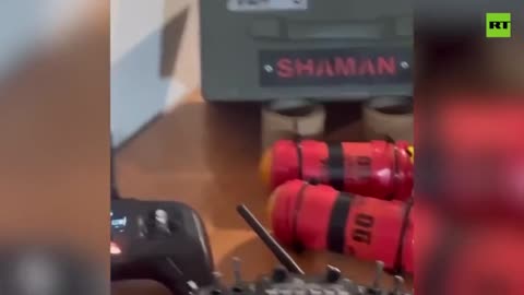 Ukrainian soldier shows off purported chemical weapons drones RT