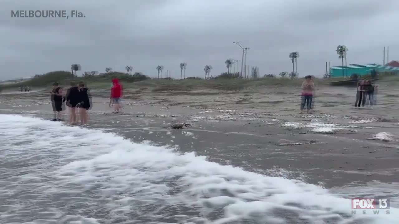 Hurricane Nicole: Weather tourists on Indialantic Beach in Melbourne, Florida