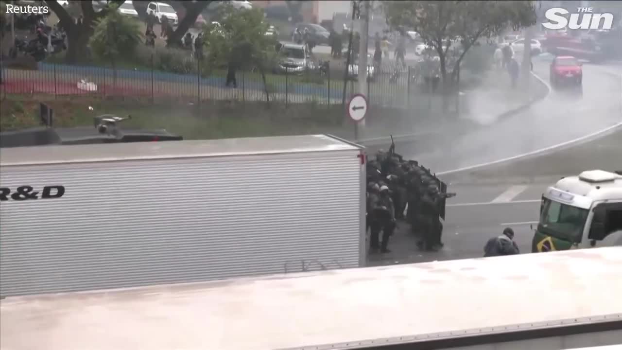 Brazilian police fire water cannons and rubber bullets at anti Lula protesters