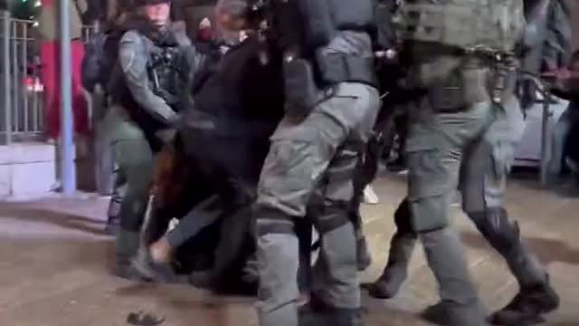 lsraeli occupation forces assault a Palestinian girl & man at Damascus Gate, occupied Jerusalem.