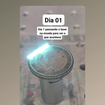 Ancient coin from Spain being cleaned with laser