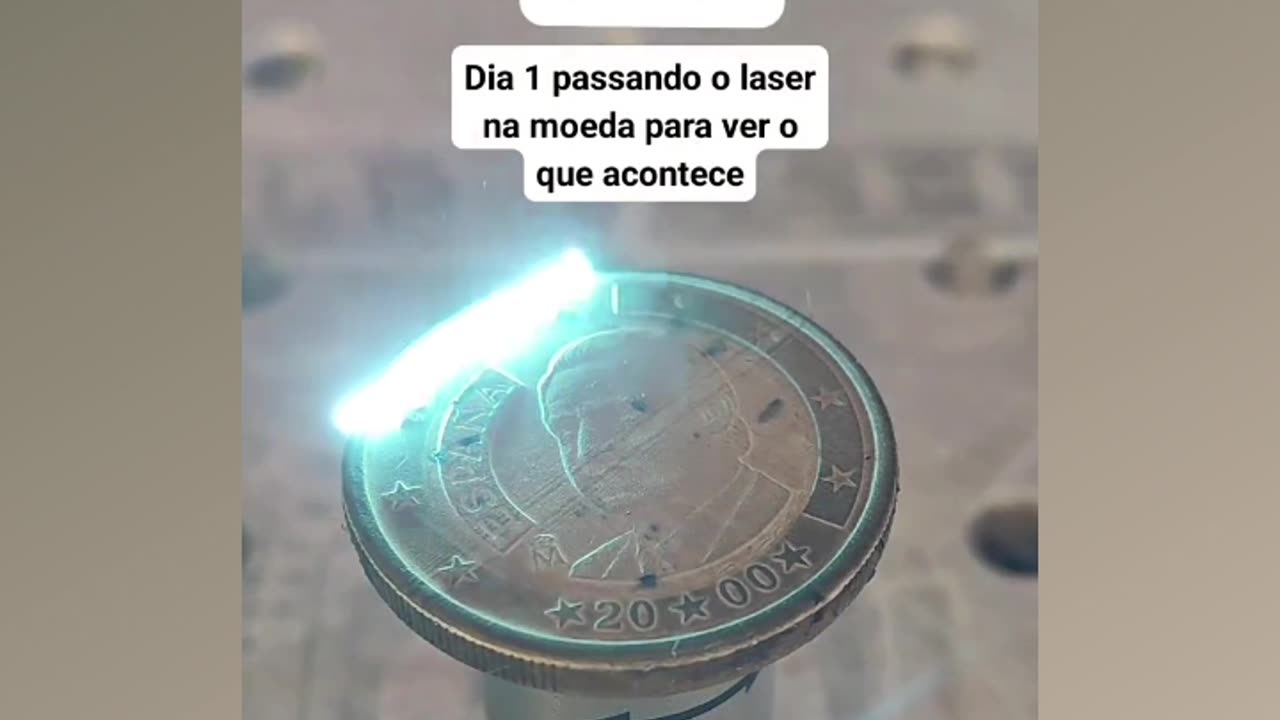 Ancient coin from Spain being cleaned with laser