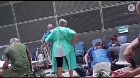 Woman Unconscious on the Floor at Vaccine Clinic