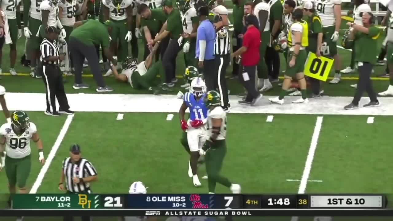 Baylor player hit sticks teammate