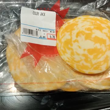 Eating Colby Jack Cheese, Dearborn Italian Bakery, Ford Rd, Dbn, MI, 10/25/23
