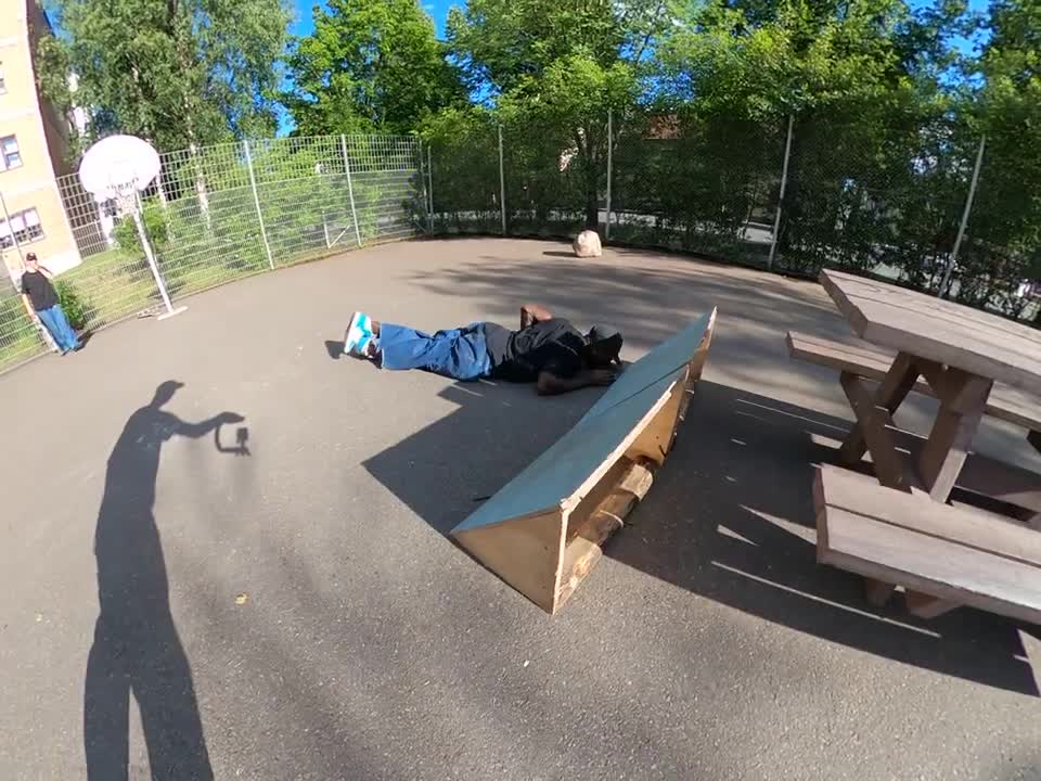 Skateboarder Slips Attempting a Noseslide on a Picnic Table