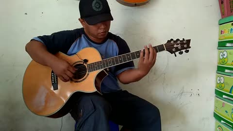 Alif Ba Ta's fingerstyle rendition of Canon Rock