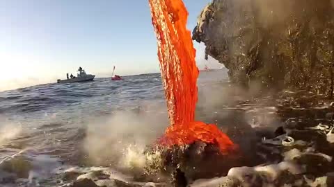 Amazing up close footage of Lava entering the ocean.